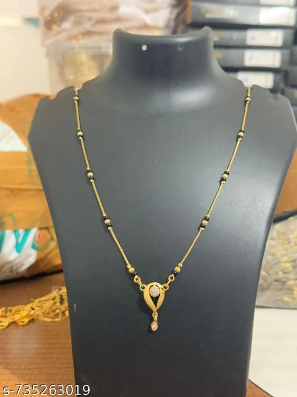Elegantt_Gold_Plated_Mangalsutra_With_Black_Beads_Curved_Dropp_Pendant_For_Ladies