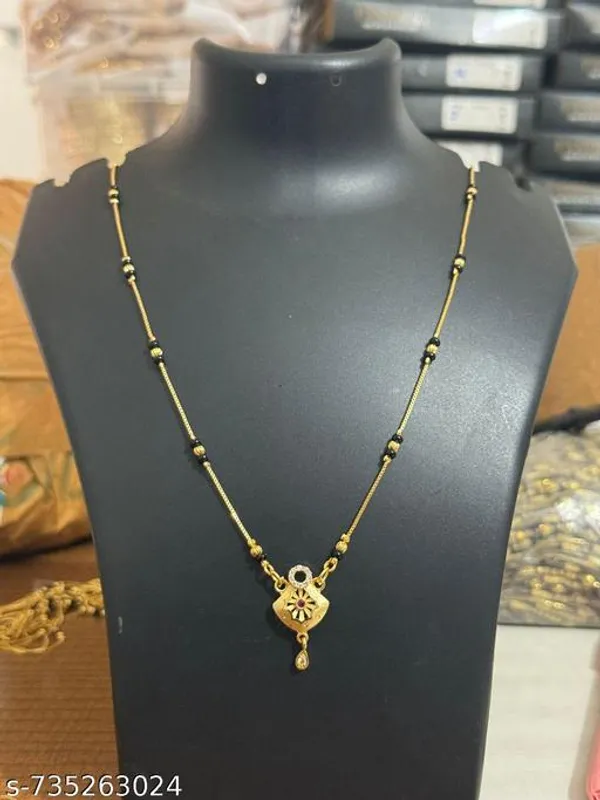 Ethnic_Gold_Plated_Mangalsutra_With_Black_Beads_Floral_Design_Pendant_For_Married_Women