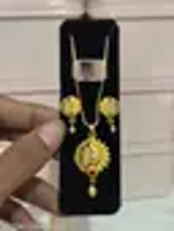 Trendy_Gold_Plated_Sunflower_Peacock_Design_Pendant_Set_Cz_Ruby_Stone_Studded_Chain_With_Matching_Earrings_For_Women_Wedding_Ethnic_Wear_Jewellery