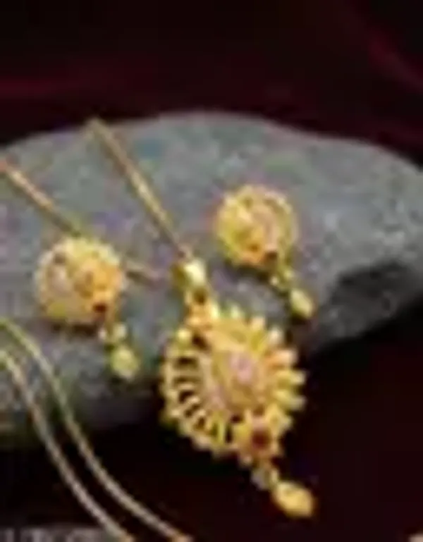 Trendy_Gold_Plated_Sunflower_Peacock_Design_Pendant_Set_Cz_Ruby_Stone_Studded_Chain_With_Matching_Earrings_For_Women_Wedding_Ethnic_Wear_Jewellery