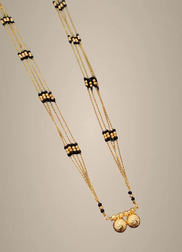 Gold_Mangalsutra_Chain_with_Black_Beads_and_Golden_Spheres