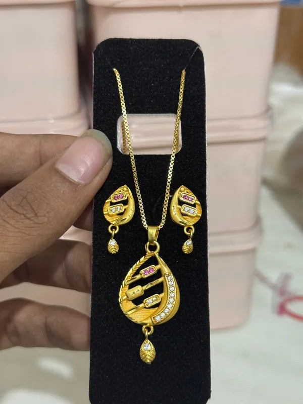 Premium_Gold_Plated_Floral_Bell_Pendant_Set_For_Women_Cz_Ruby_Stone_Studded_Chain_Necklace_With_Matching_Drop_Earrings_Traditional_Party_Wear_Jewellery