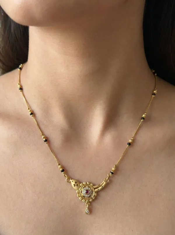 Elegant_Gold_Plated_Traditional_Necklace_For_Women_Black_Beads_Chain_With_Designer_Pendant_Daily_Wear_Festive_Jewellery_Necklace