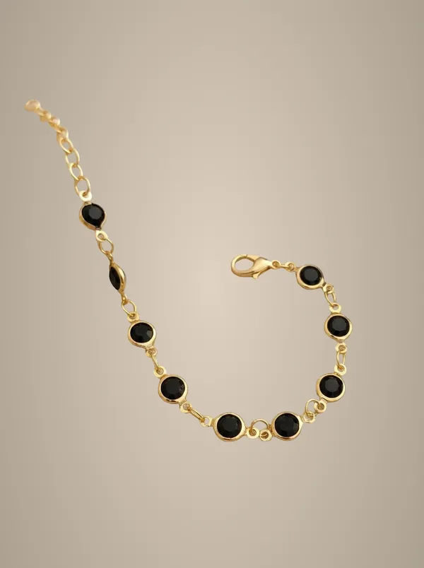Elegant_Gold-Tone_Bracelet_with_Black_Stone_Accents