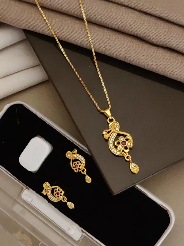 Elegant_Gold_Plated_Floral_Round_Pendant_Set_For_Women_Cz_Ruby_Stone_Studded_Designer_Chain_With_Matching_Drop_Earrings_Wedding_Festive_Wear_Jewellery