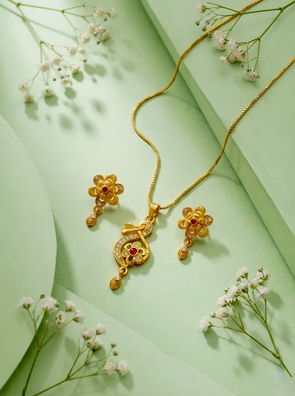 Elegant_Gold_Plated_Floral_Round_Pendant_Set_For_Women_Cz_Ruby_Stone_Studded_Designer_Chain_With_Matching_Drop_Earrings_Wedding_Festive_Wear_Jewellery