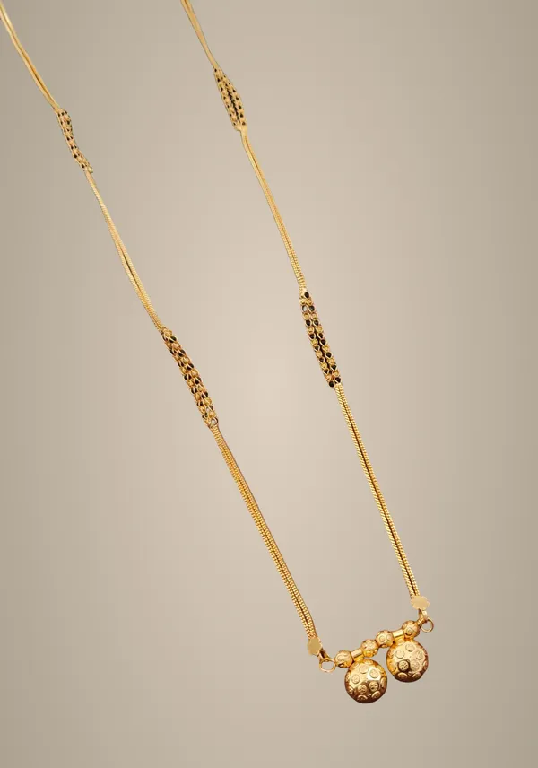 Dual-Tone_Gold_Chain_Necklace_with_Textured_Ball_Pendants