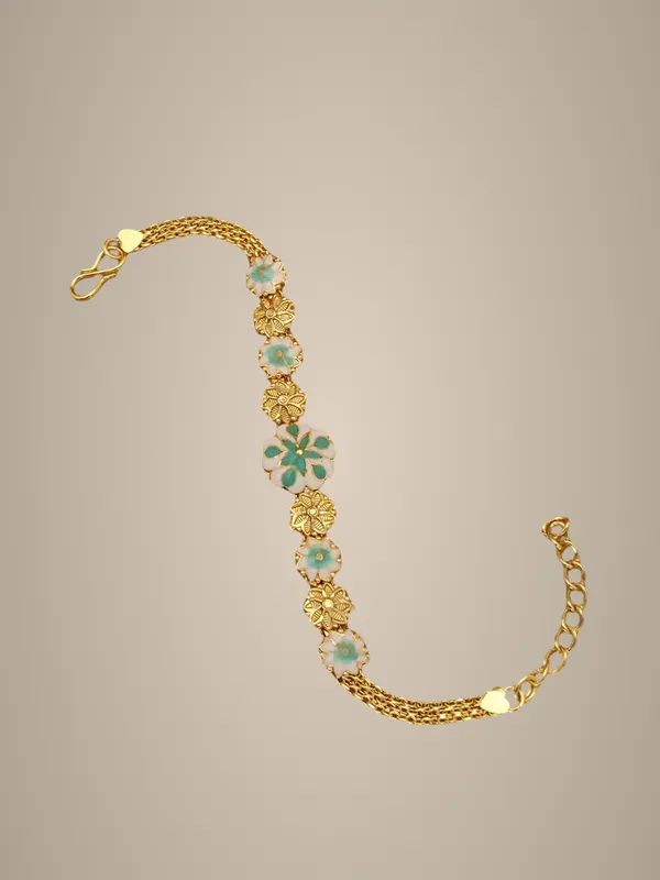 Elegant_Floral_Charm_Bracelet_with_Turquoise_Accents