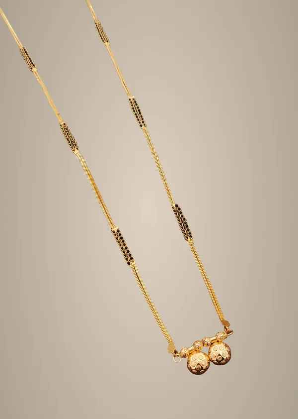 Gold-Toned_Layered_Chain_Necklace_with_Textured_Ball_Pendant