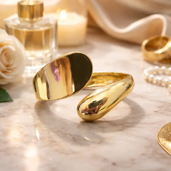 Gold-Plated_Curved_Statement_Bracelet_With_Mirror_Finish