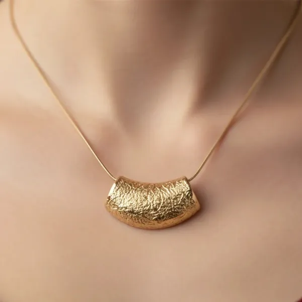 Textured_Gold-Tone_Crescent_Statement_Necklace_And_Elegant_Gold-Toned_Multi-Band_Bracelet_With_Crystal_Embellishments_Pack_Of_2