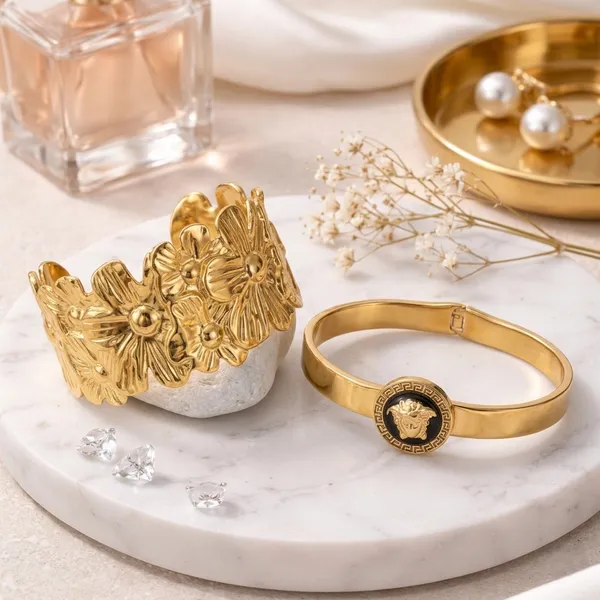 Elegant_Gold-Tone_Medusa_Emblem_Bangle_Bracelet_And_Gold-Toned_Floral_Cuff_Bracelet_Pack_Of_2