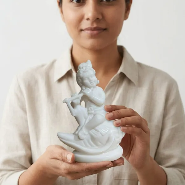 Kanha_Playing_Flute_On_Shell_Figurine_5"
