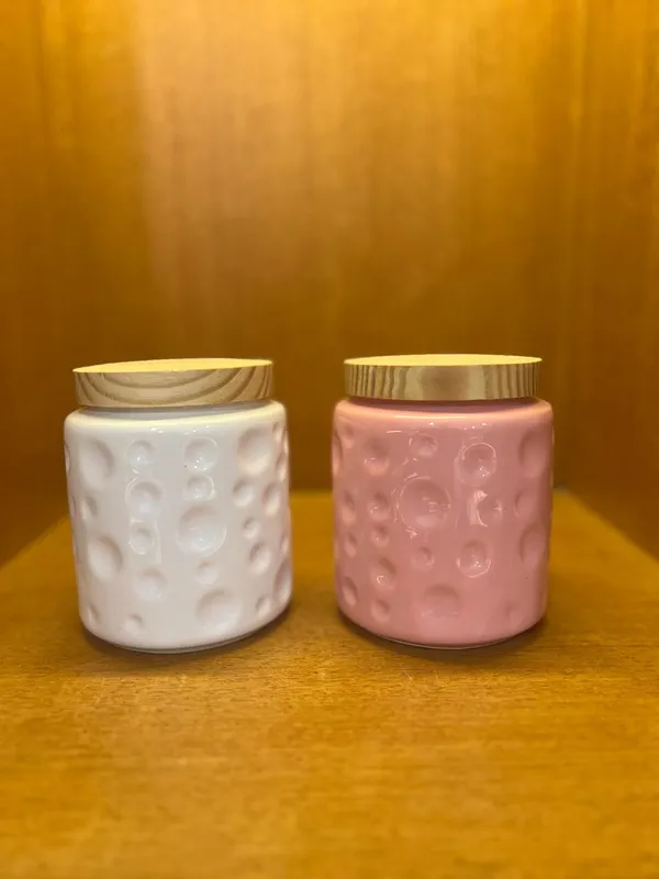 Textured_Ceramic_Jar_Set_With_Wooden_Lids_-_Set_Of_2_(White_&_Pink)