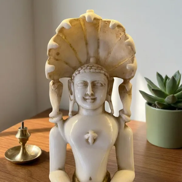 Handcrafted_Jain_Tirthankara_Idol_In_Meditation_Pose_With_Serpent_Canopy._11"