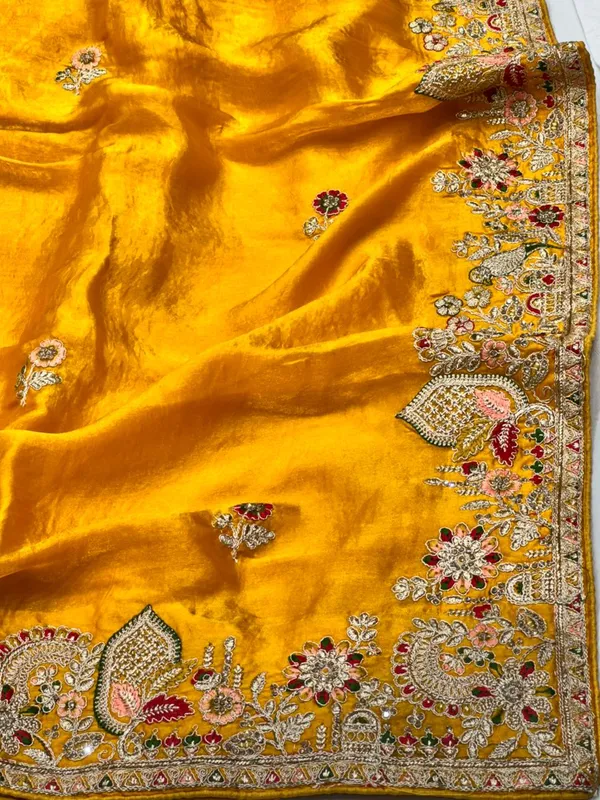 Vibrant_Yellow_Velvet_Saree_With_Zari_Embroidery_And_Embellished_Border