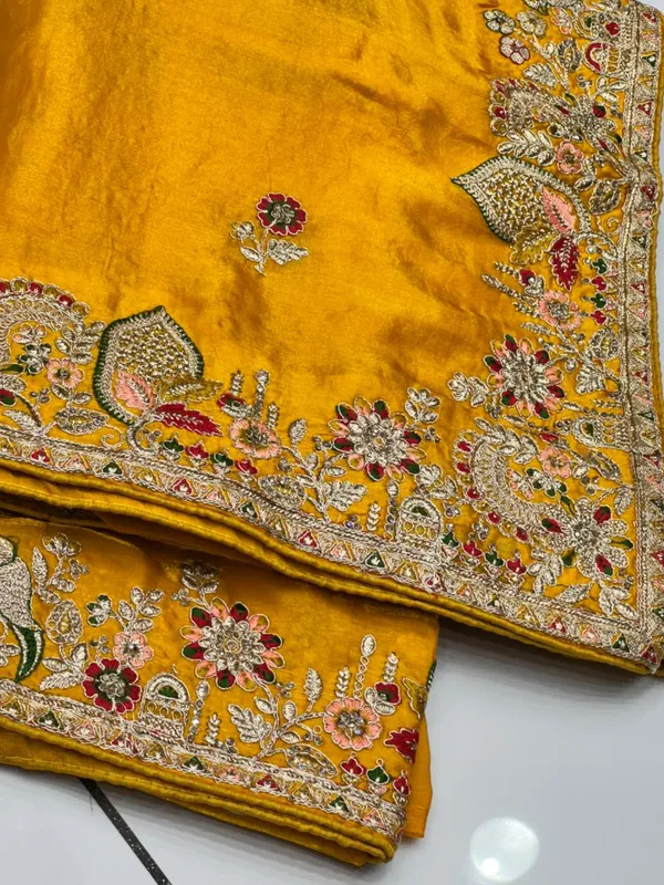 Vibrant_Yellow_Velvet_Saree_With_Zari_Embroidery_And_Embellished_Border