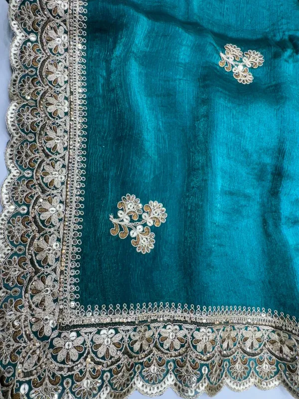Teal_Green_Velvet_Saree_With_Golden_Embroidered_Border_And_Floral_Motifs