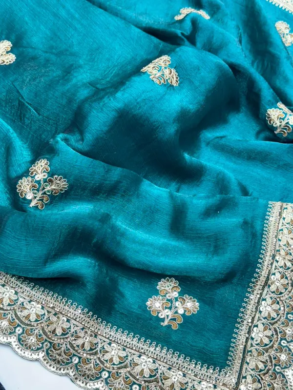 Teal_Green_Velvet_Saree_With_Golden_Embroidered_Border_And_Floral_Motifs