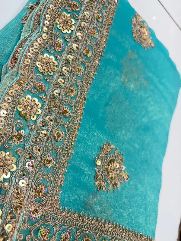 Turquoise_Blue_Embellished_Ethnic_Saree_With_Golden_Sequin_And_Zari_Work