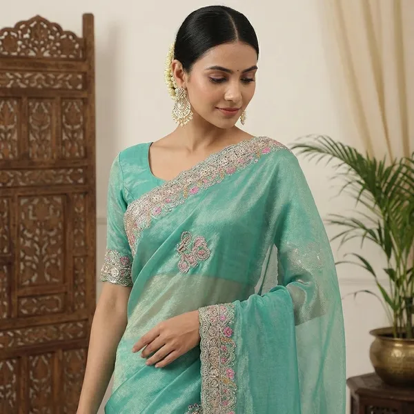 Turquoise_Embellished_Saree_With_Floral_Border_And_Silver_Sequin_Work