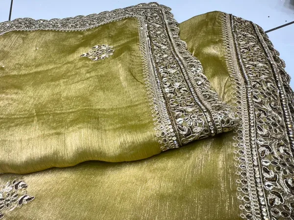 Lime_Green_Silk_Saree_With_Silver_Sequin_And_Zari_Border_Work