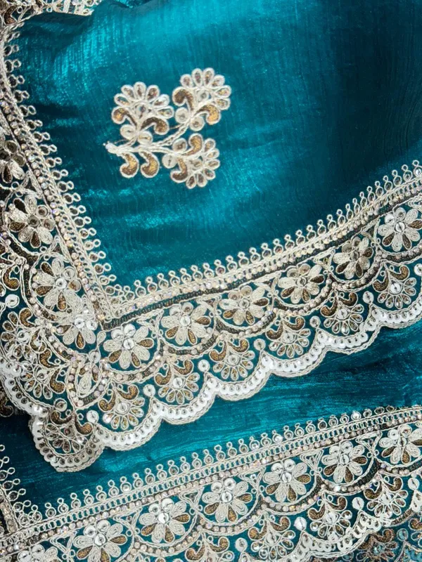 Teal_Green_Velvet_Saree_With_Golden_Embroidered_Border_And_Floral_Motifs