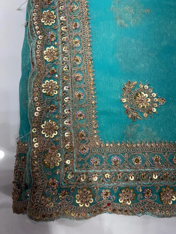 Turquoise_Blue_Embellished_Ethnic_Saree_With_Golden_Sequin_And_Zari_Work