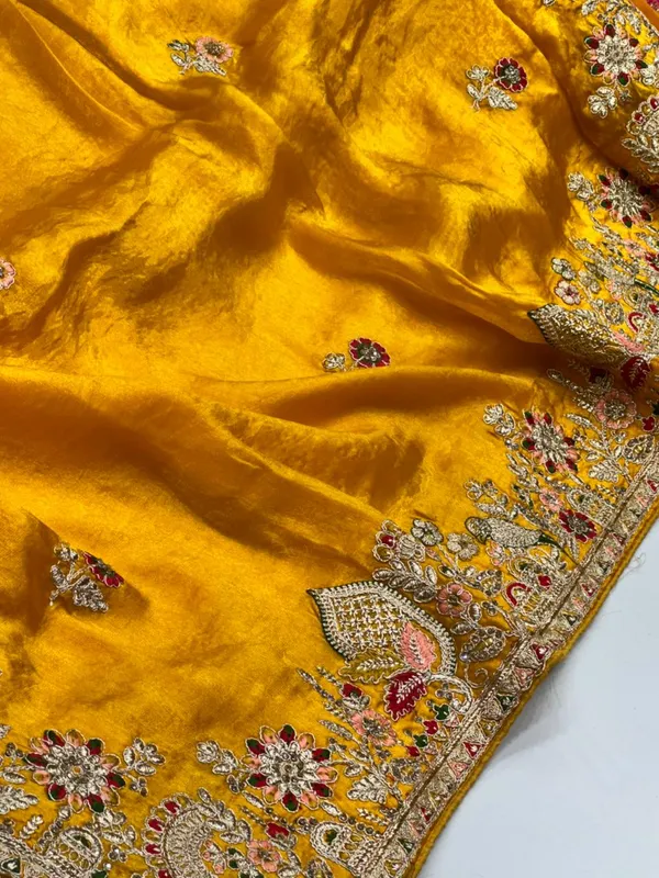 Vibrant_Yellow_Velvet_Saree_With_Zari_Embroidery_And_Embellished_Border