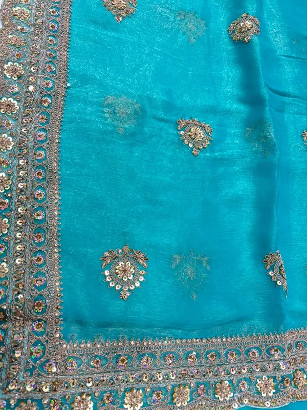 Turquoise_Blue_Embellished_Ethnic_Saree_With_Golden_Sequin_And_Zari_Work