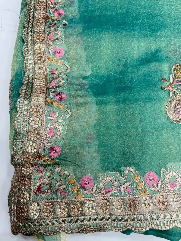 Turquoise_Embellished_Saree_With_Floral_Border_And_Silver_Sequin_Work