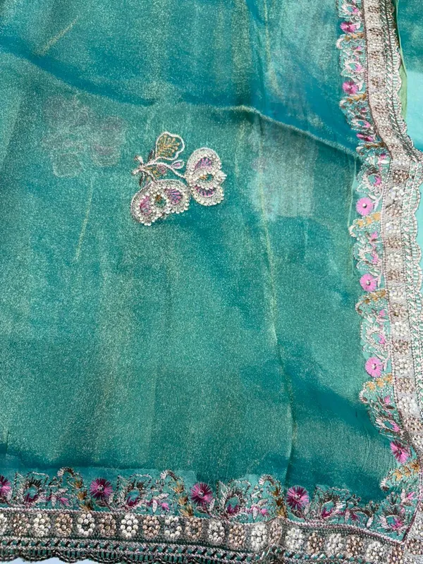 Turquoise_Embellished_Saree_With_Floral_Border_And_Silver_Sequin_Work