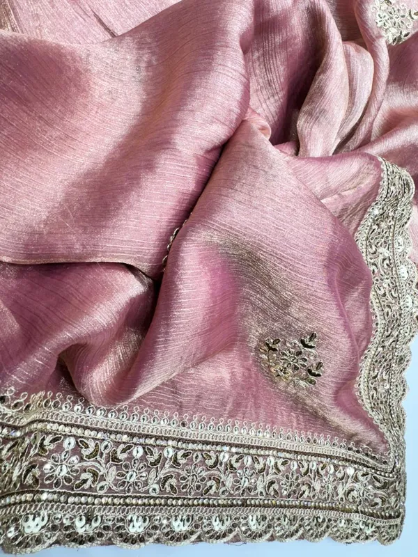 Pink_Silk_Saree_With_Embroidered_Border_And_Gold_Embellishments