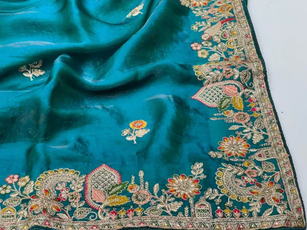 Turquoise_Silk_Saree_With_Intricate_Floral_Embroidery_And_Zari_Work