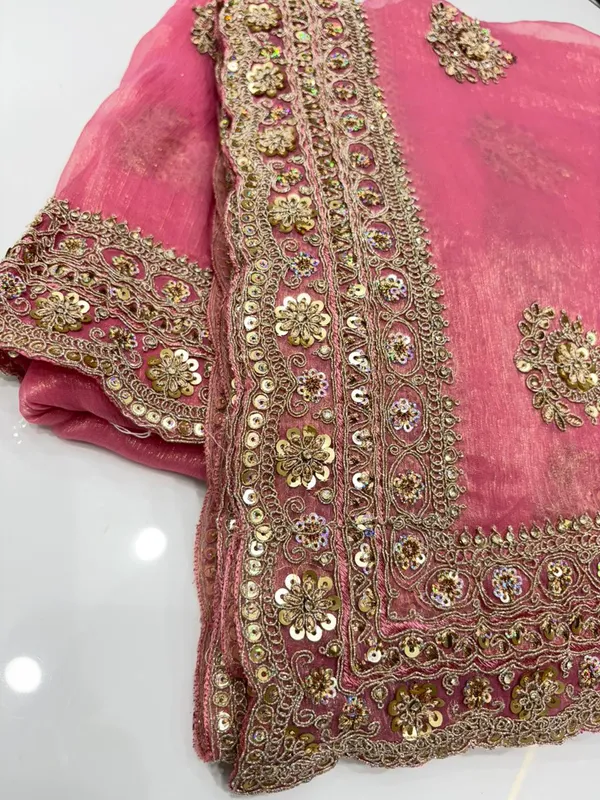 Pink_Organza_Saree_With_Silver_Cherry_Embroidery_And_Heavy_Border