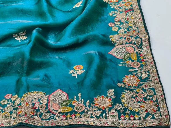 Turquoise_Silk_Saree_With_Intricate_Floral_Embroidery_And_Zari_Work