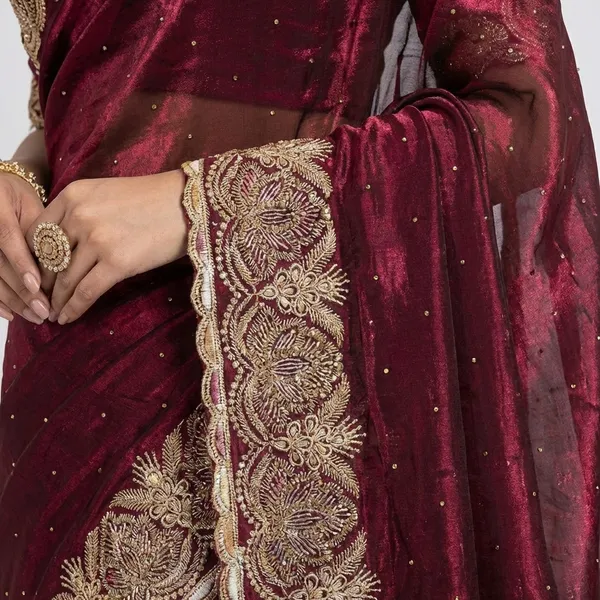 Maroon_Velvet_Saree_With_Golden_Embroidered_Border_And_Sequin_Work