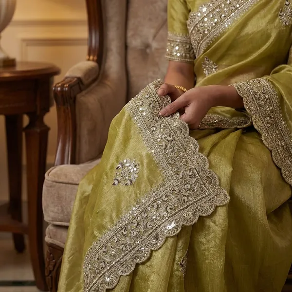 Lime_Green_Silk_Saree_With_Silver_Sequin_And_Zari_Border_Work
