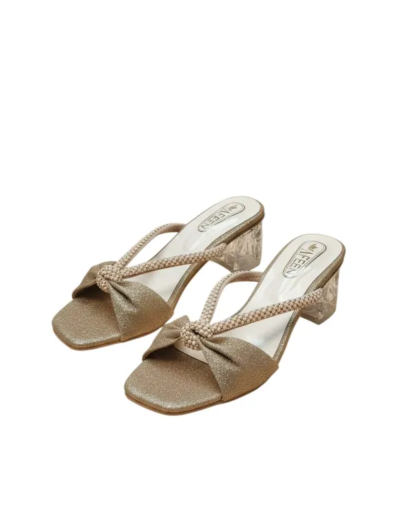 Effortless_Glamour_With_These_Stunning_Mule_Heels_Designed_To_Add_A_Touch_Of_Sparkle_To_Every_Outfit_Featuring_A_Chic_Open_Toe_Silhouette_And_A_Beautifully_Crafted_Bow_Detail_These_Sandals_Are_Perfect_For_Both_Festive_Occasions_And_Evening_Outings
