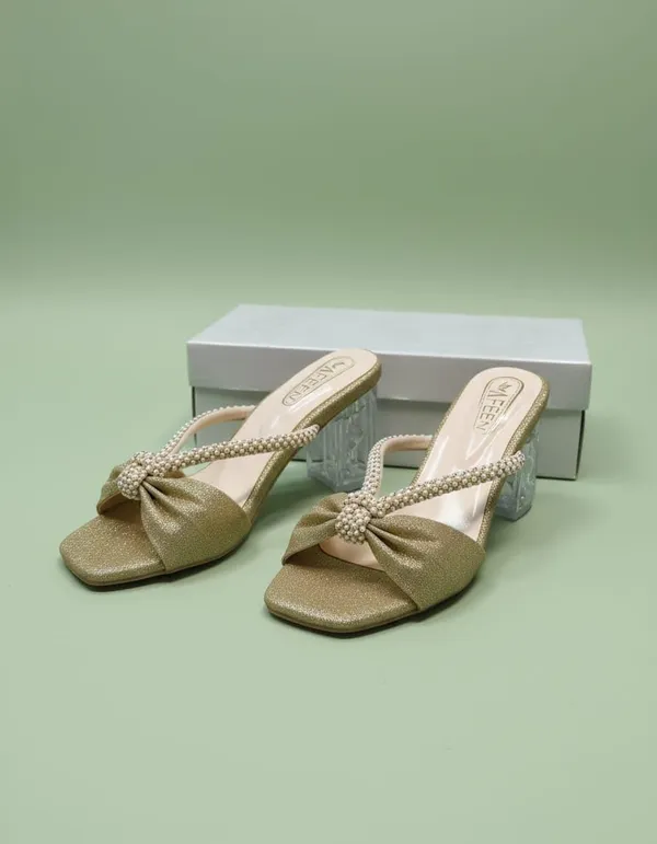 Effortless_Glamour_With_These_Stunning_Mule_Heels_Designed_To_Add_A_Touch_Of_Sparkle_To_Every_Outfit_Featuring_A_Chic_Open_Toe_Silhouette_And_A_Beautifully_Crafted_Bow_Detail_These_Sandals_Are_Perfect_For_Both_Festive_Occasions_And_Evening_Outings