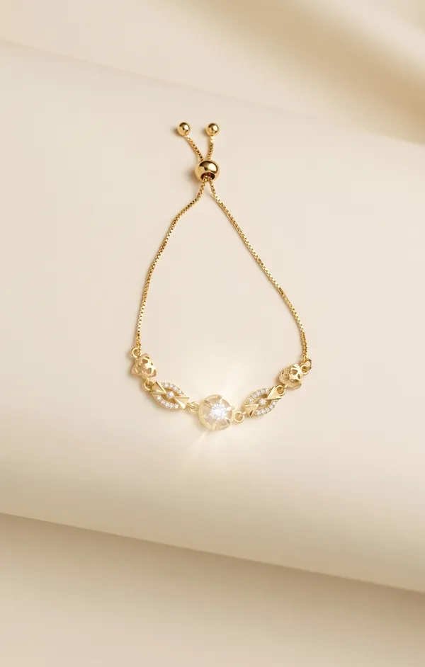 Gold-Toned_Floral_Filigree_Bracelet_With_Adjustable_Chain