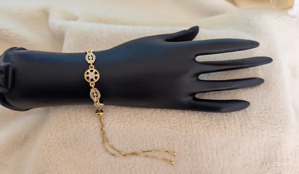 Gold-Toned_Floral_Filigree_Bracelet_With_Adjustable_Chain