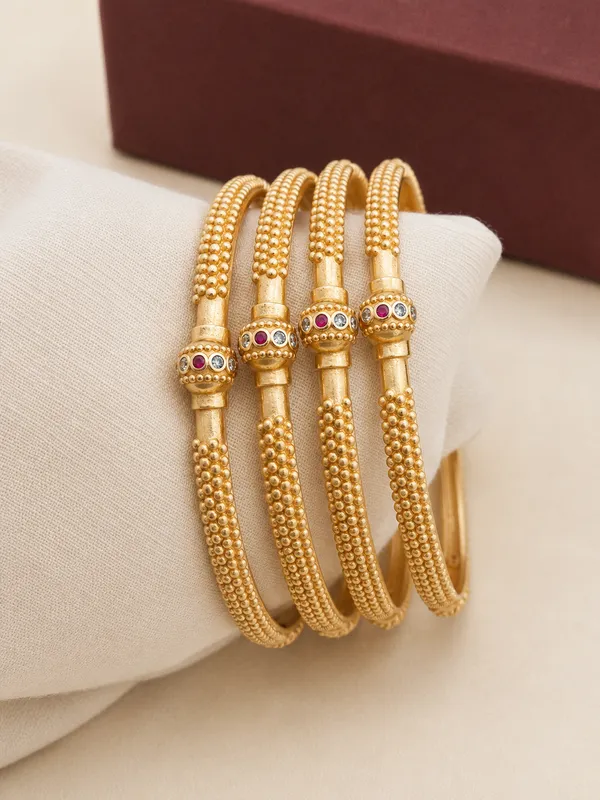 Gold_Plated_Textured_Bangles_With_Gemstone_Accents_For_Women