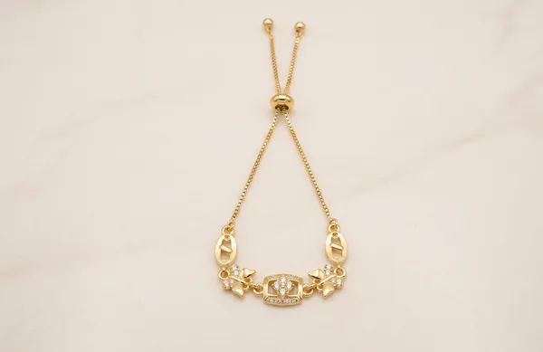 Gold-Tone_Adjustable_Bracelet_With_Multicolor_Stones