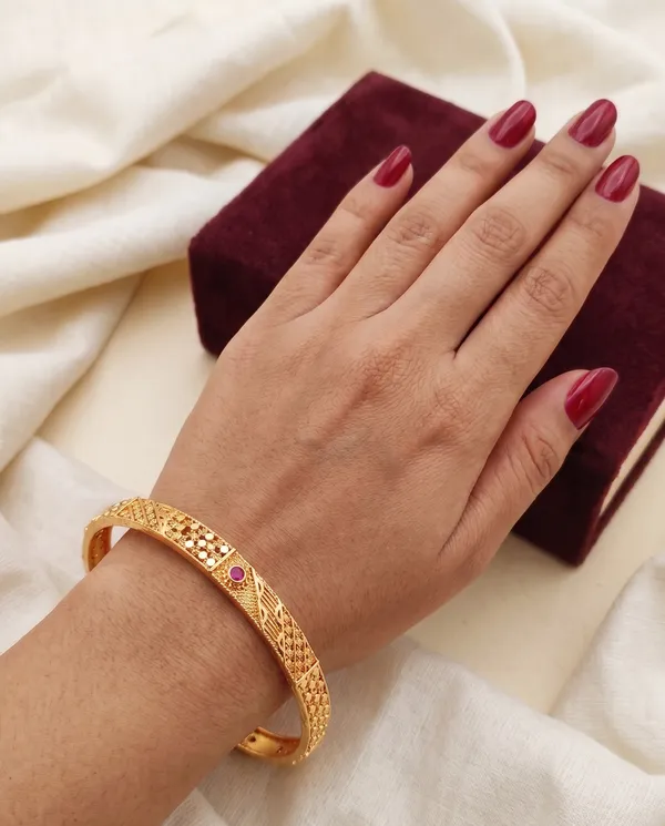 Gold_Plated_Textured_Bangles_With_Ruby_Accents_Set_Of_2