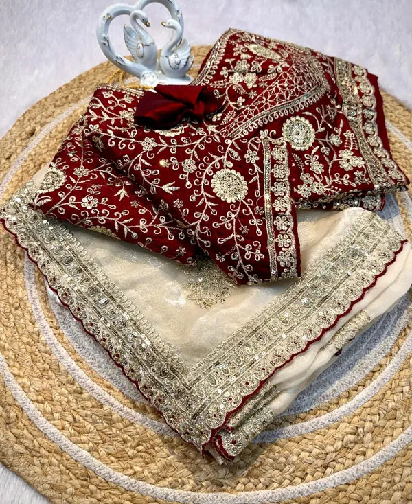 Elegant_Cream_Silk_Saree_With_Embroidered_Maroon_Velvet_Blouse
