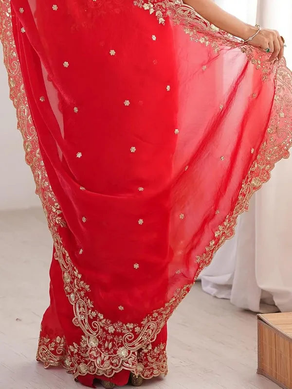 Red_Embroidered_Saree_With_Golden_Embellished_Blouse