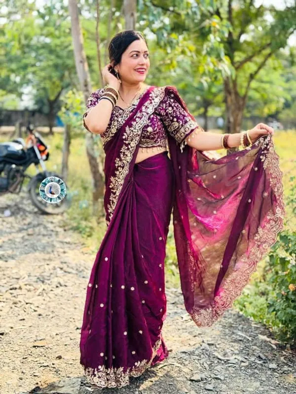 Purple_Embroidered_Silk_Saree_With_Heavy_Border_Work_And_Blouse