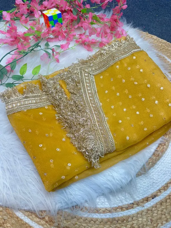 Mustard_Yellow_Georgette_Saree_With_Heavy_Golden_Embroidered_Border