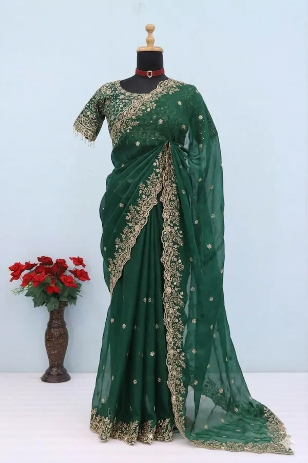 Elegant_Green_Georgette_Saree_With_Embroidered_Border_And_Blouse